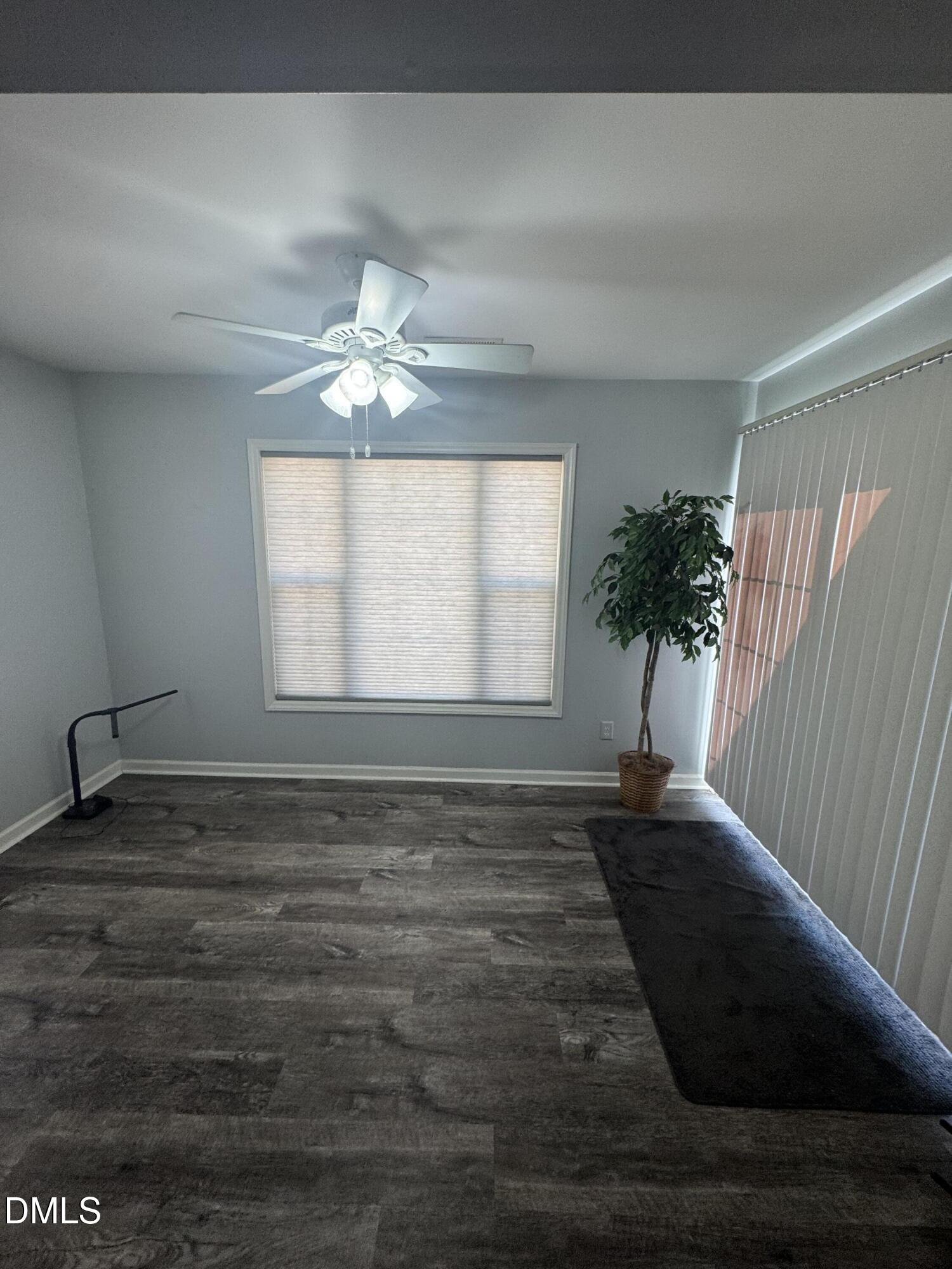 11351 Clubhaven Place, Unit 100 Raleigh, NC 27617 - Photo 16 of 29 a view of an empty room and window