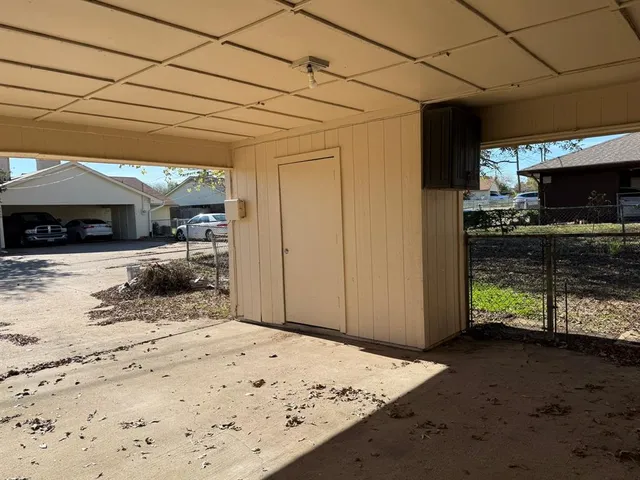 a view of a backyard of the house