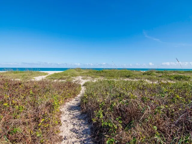 a view of beach and ocean view