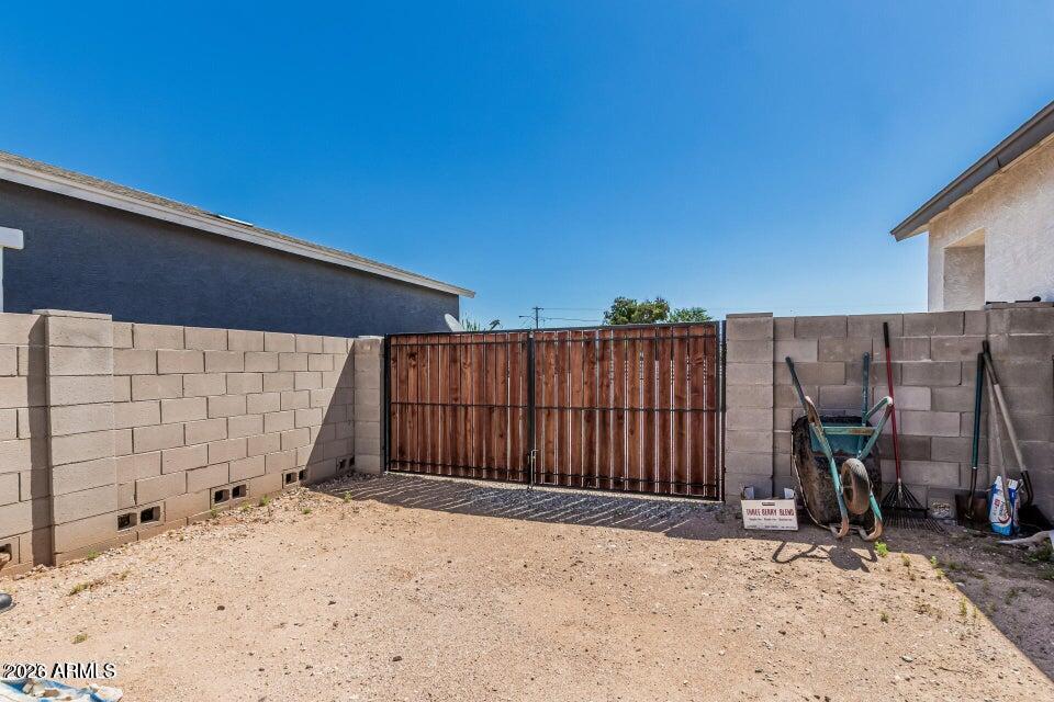 32102 North Walnut Street Wittmann, AZ 85361 - Photo 17 of 18 a view of a backyard