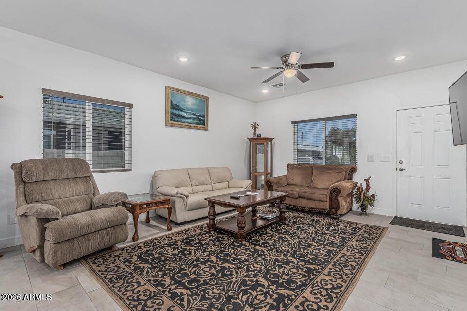 32102 North Walnut Street Wittmann, AZ 85361 - Photo 5 of 18 a living room with furniture and a window