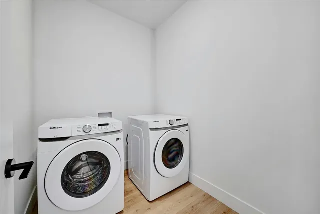 a view of a hallway with a chandelier