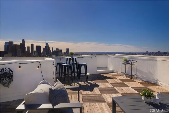 a view of a terrace with furniture