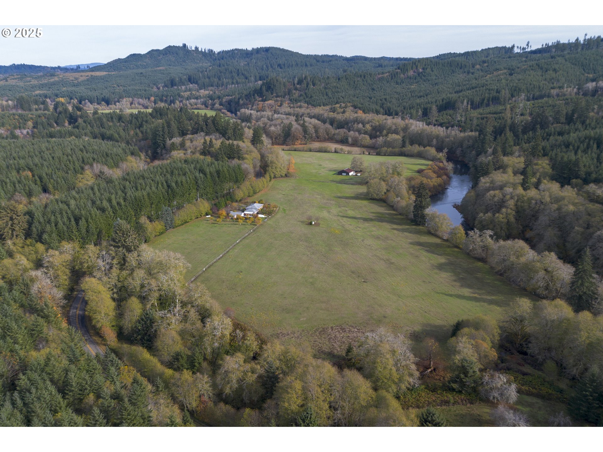 0 Highway 103 Seaside, OR 97138 - Photo 19 of 29 a view of a town with trees in the background