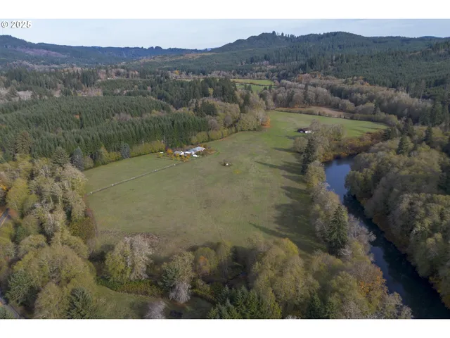 a view of a town with mountains in the background