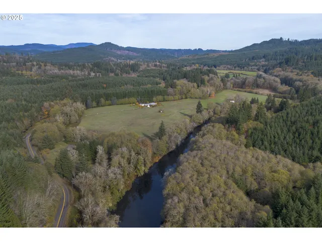 a view of a town with mountains in the background