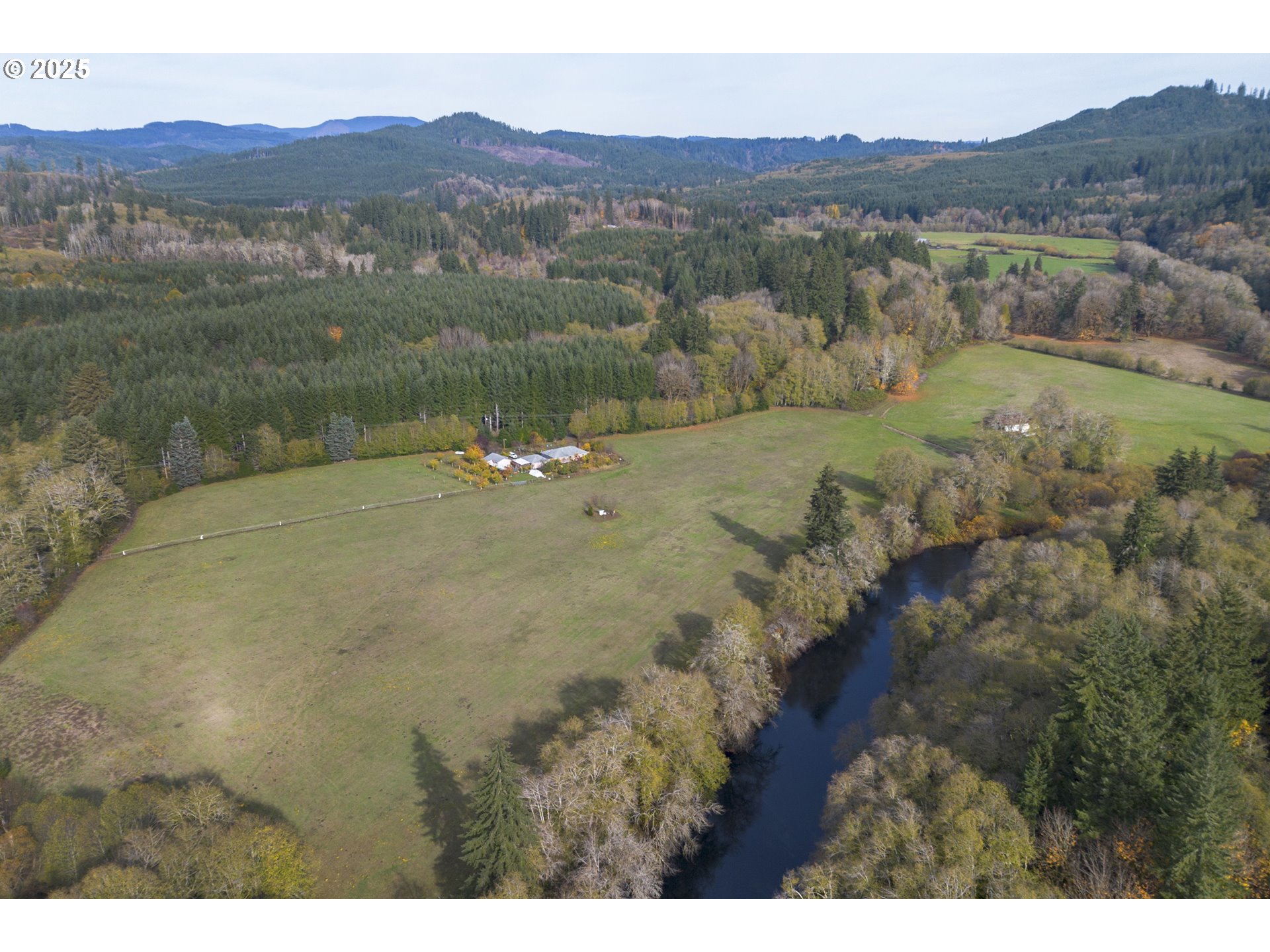 0 Highway 103 Seaside, OR 97138 - Photo 22 of 29 a view of a town with mountains in the background