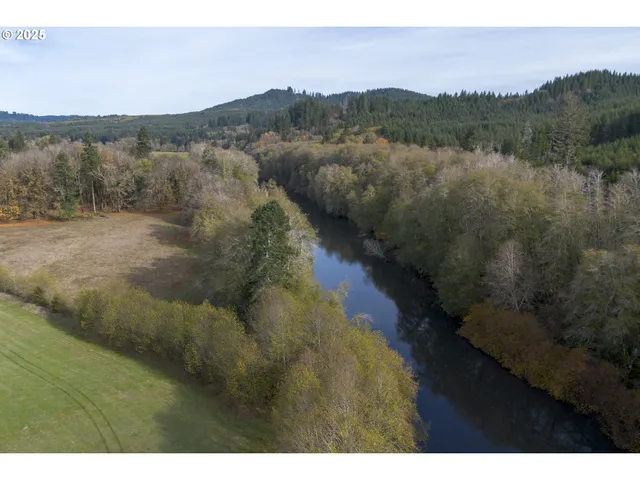 a view of a city and mountains in the background