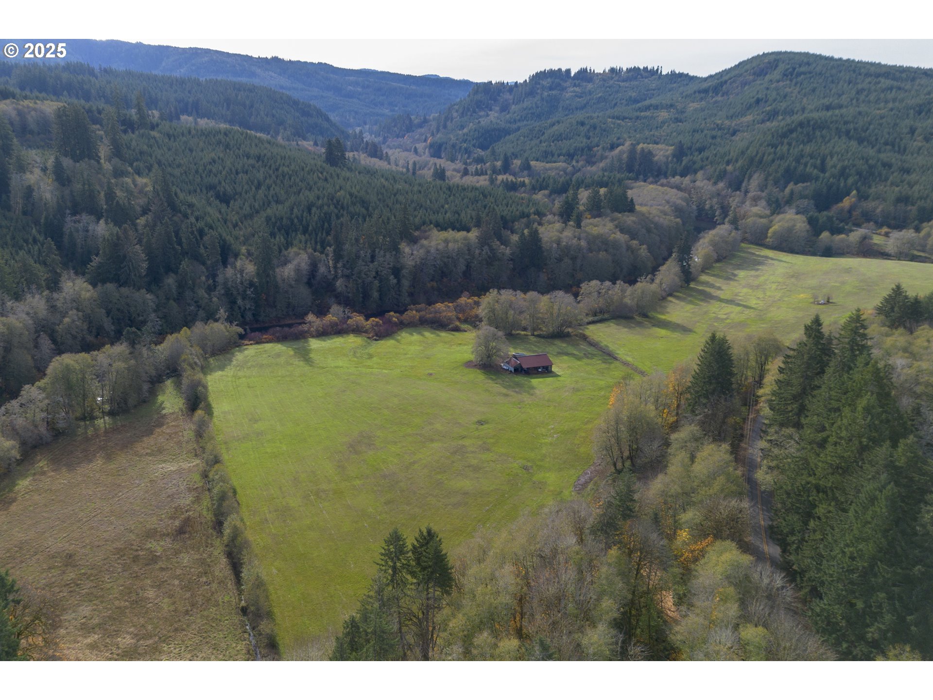0 Highway 103 Seaside, OR 97138 - Photo 4 of 29 a view of a house with a mountain