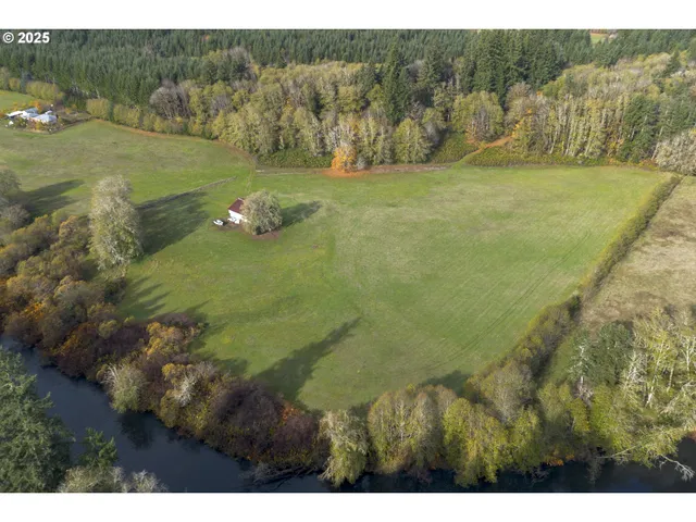 a view of a field with an ocean
