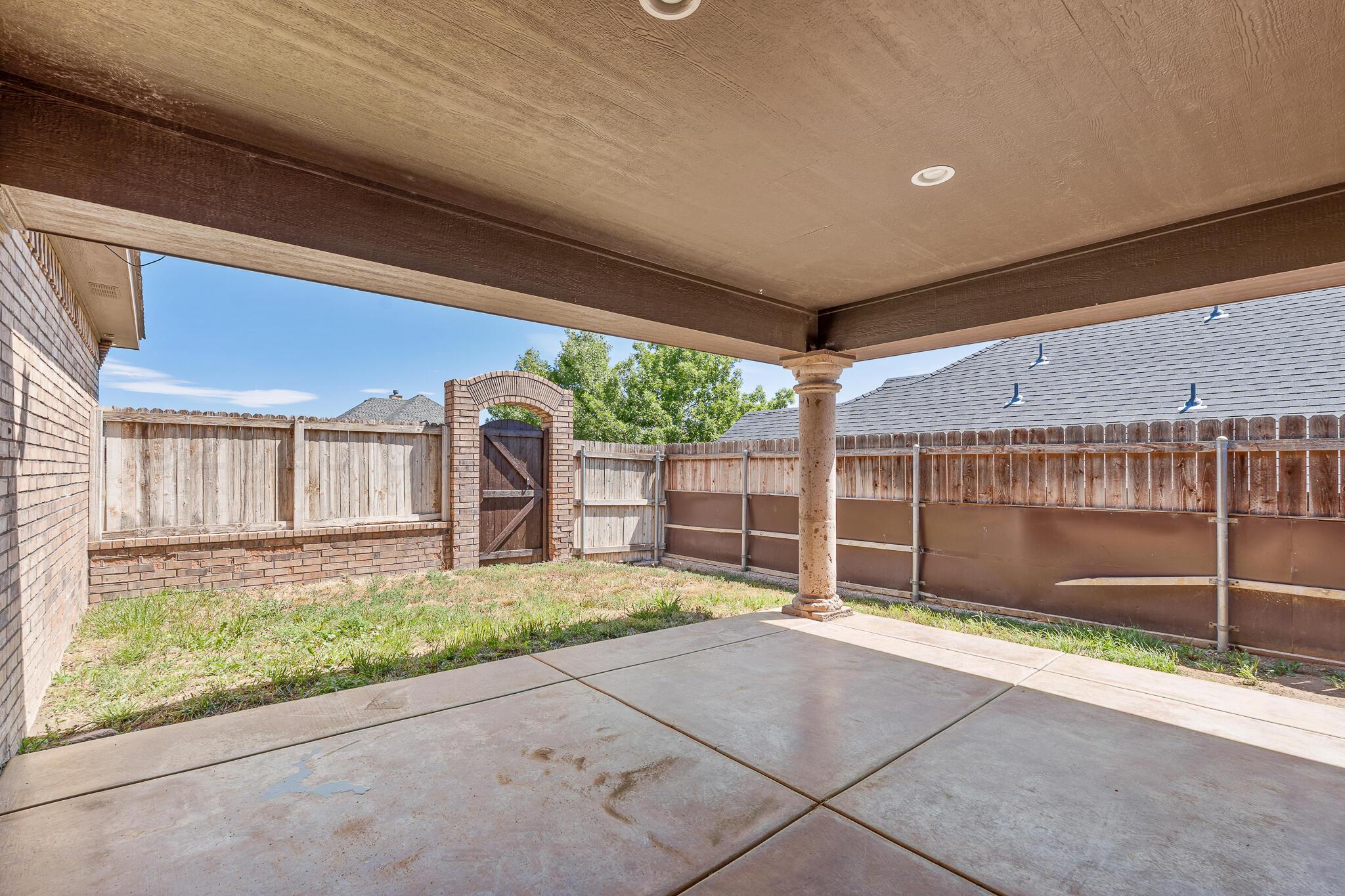 6903 Spring Cherry Lane Amarillo, TX 79124 - Photo 18 of 41 Kitchen Patio - morning coffee solitude!