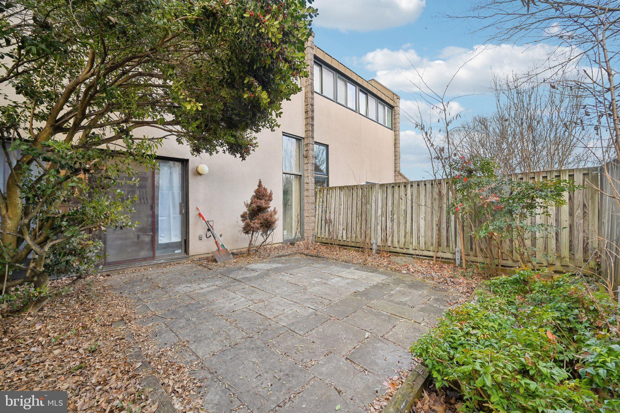 2303 Bayleaf Court Baltimore, MD 21209 - Photo 36 of 37 a view of a house with a yard and garage