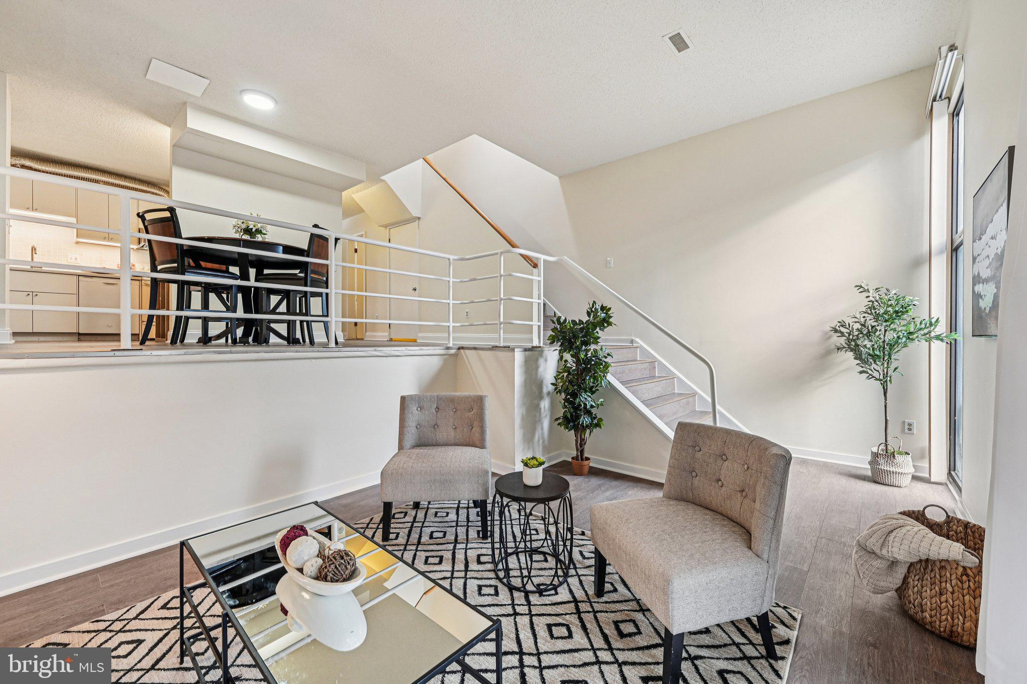 2303 Bayleaf Court Baltimore, MD 21209 - Photo 7 of 37 a living room with furniture and wooden floor
