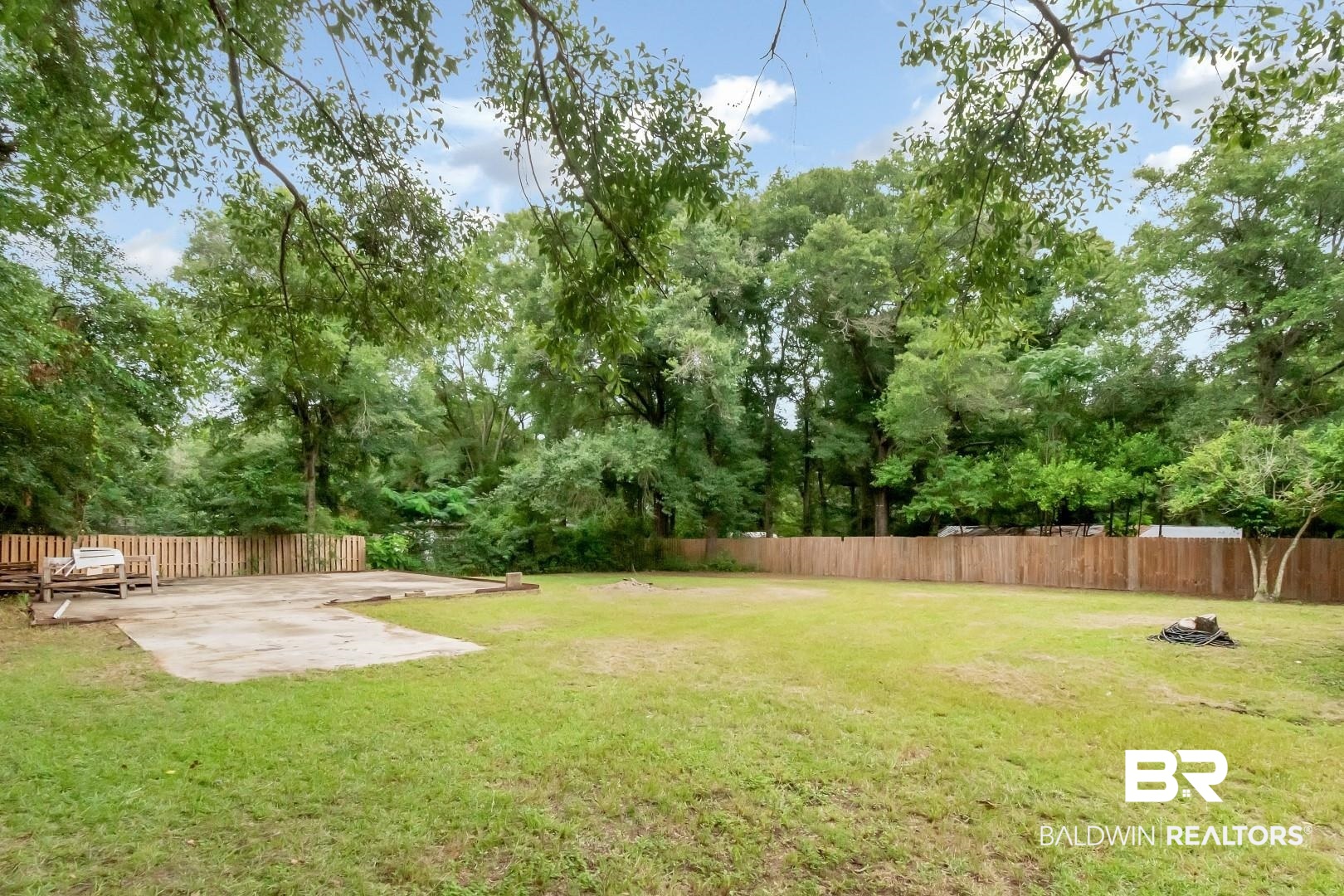 15060 Starlight Avenue Wilmer, AL 36587 - Photo 12 of 12 View of yard featuring a patio