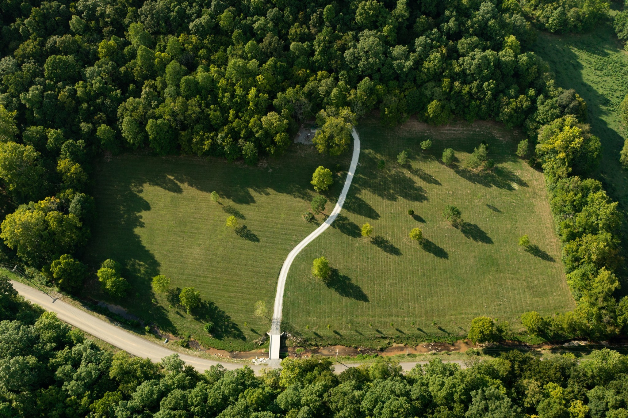 5824 Garrison Road Franklin, TN 37064 - Photo 5 of 22 an aerial view of a residential houses with outdoor space and trees all around