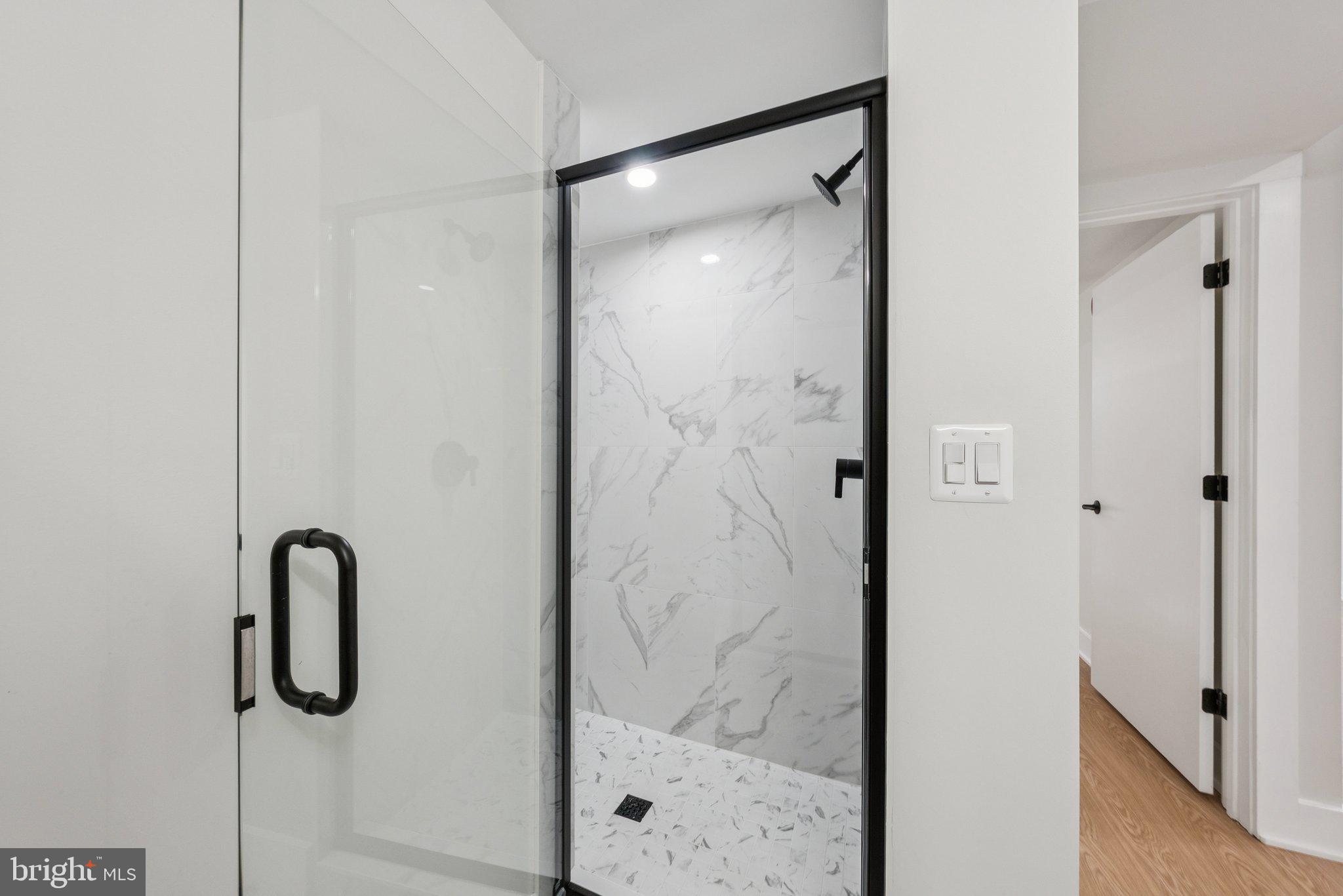 2134 Wisconsin Avenue Northwest, Unit 1 Washington, DC 20007 - Photo 17 of 32 a bathroom with a shower