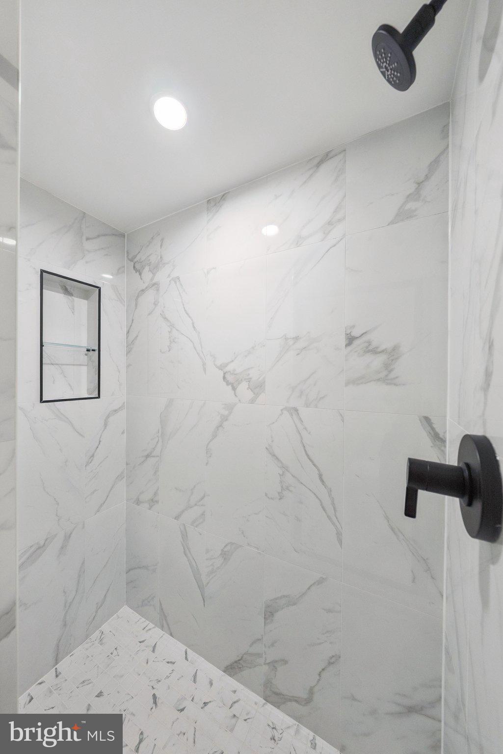 2134 Wisconsin Avenue Northwest, Unit 1 Washington, DC 20007 - Photo 18 of 32 a bathroom with a shower