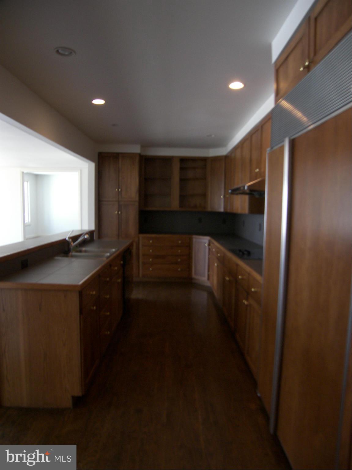 18458 Blue Ridge Mountain Road Bluemont, VA 20135 - Photo 19 of 30 a kitchen with stainless steel appliances a sink stove and refrigerator