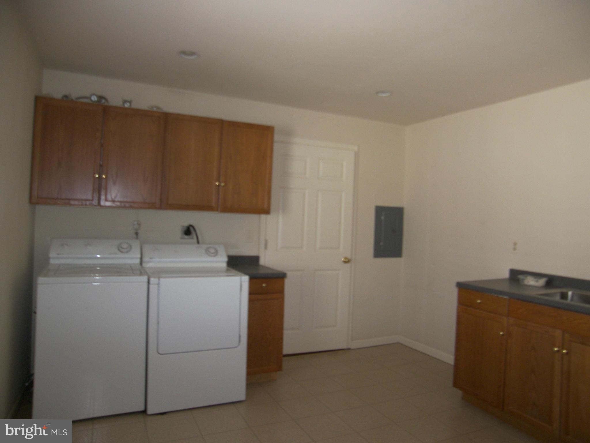 18458 Blue Ridge Mountain Road Bluemont, VA 20135 - Photo 20 of 30 a utility room with dryer and washer