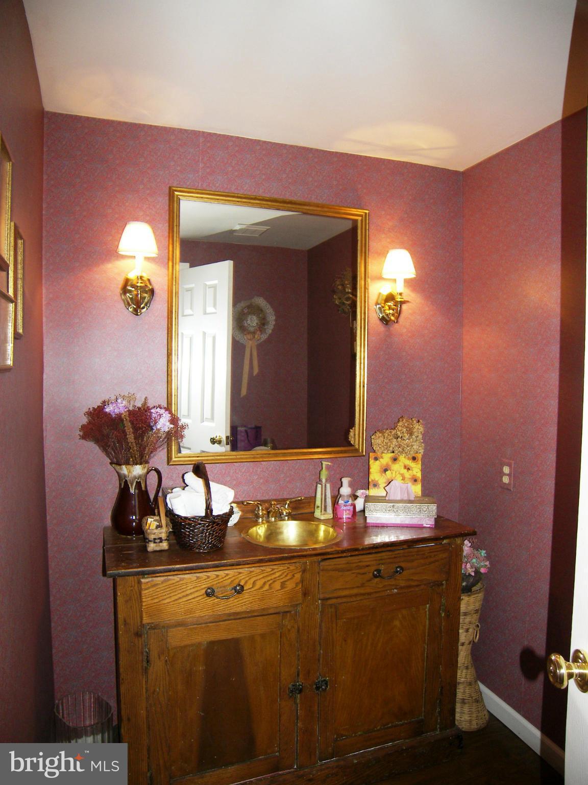 18458 Blue Ridge Mountain Road Bluemont, VA 20135 - Photo 10 of 30 a bathroom with a sink and a mirror