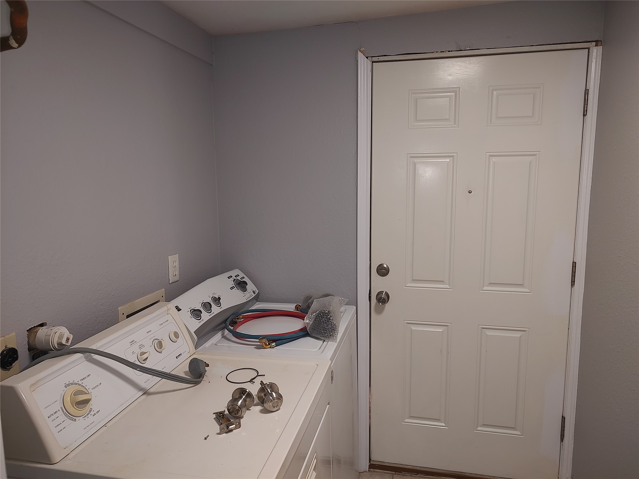 2617 Wheless Lane Austin, TX 78723 - Photo 13 of 14 Laundry area with washing machine and clothes dryer