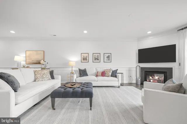 a kitchen with a table and chairs in it