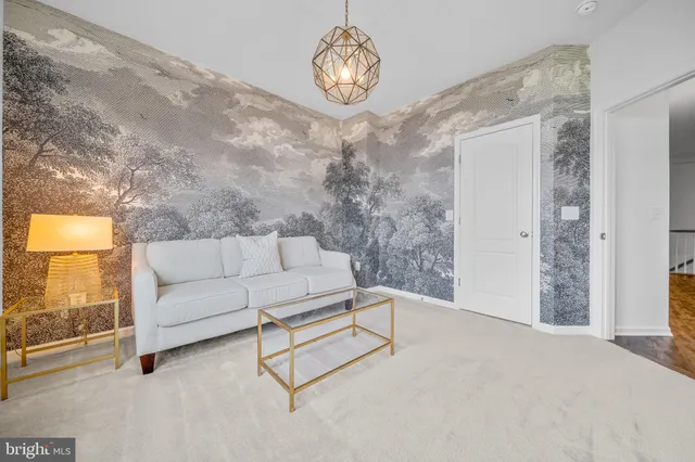 a view of a house with backyard and porch