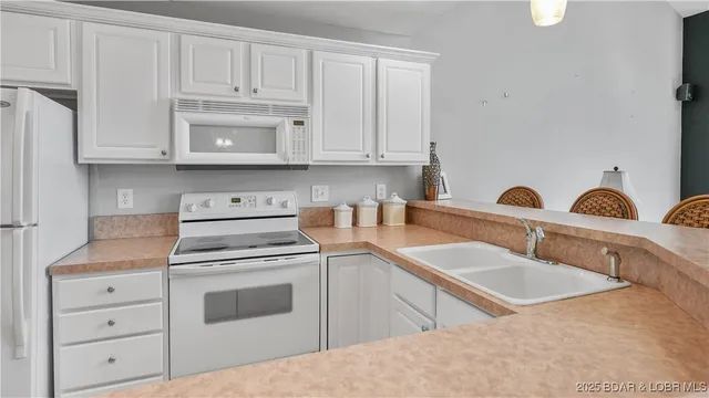 $295,000 | 75 Cedar Heights Lane, Unit 4D, Camdenton, MO 65020