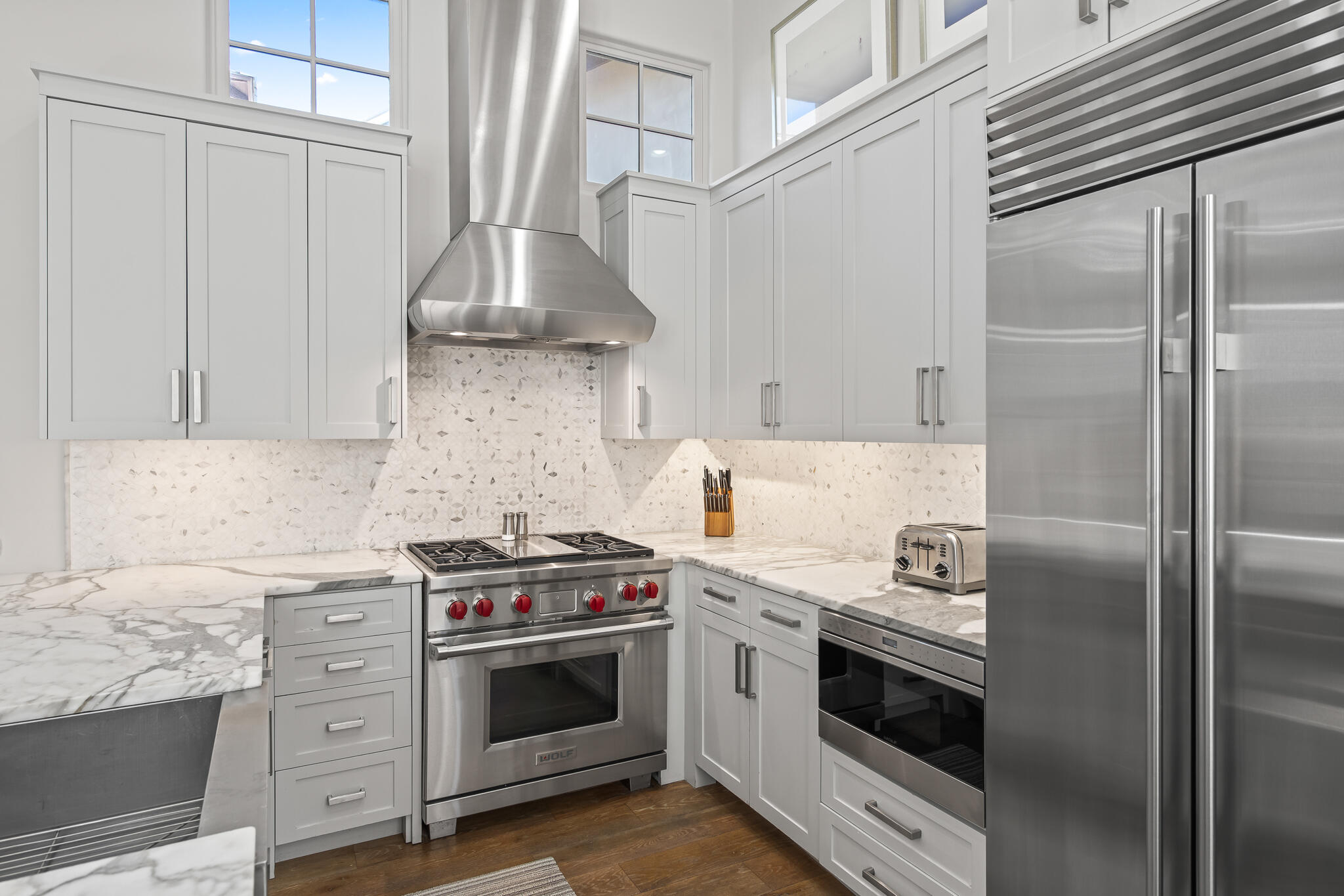 188 Round Road Inlet Beach, FL 32461 - Photo 18 of 98 a kitchen with stainless steel appliances granite countertop a stove and a refrigerator