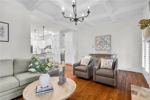 a view of entryway with wooden floor and windows