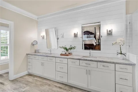 a view of a swimming pool with a yard