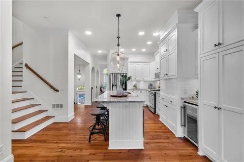 a living room with fireplace furniture and a flat screen tv