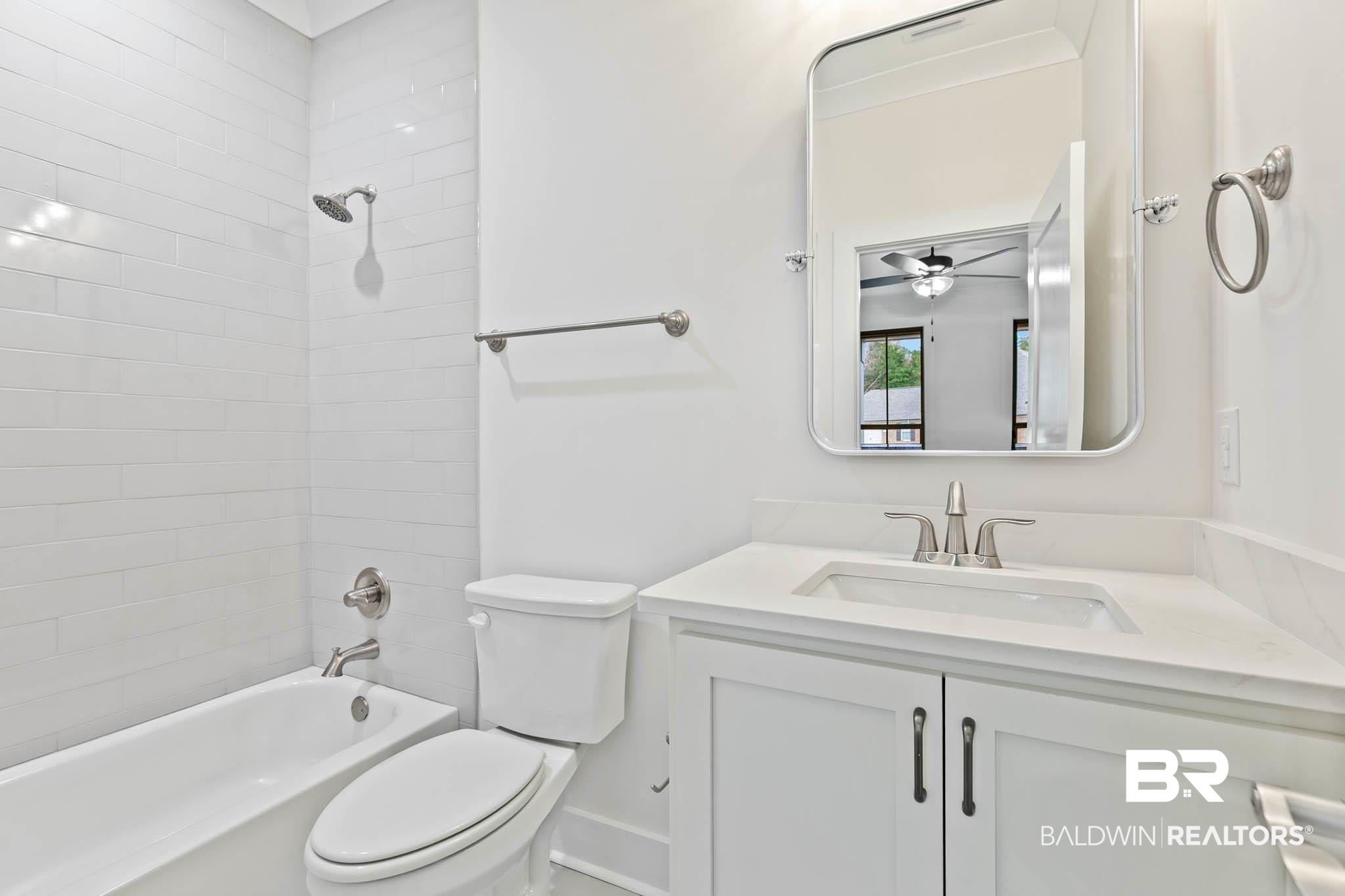 6656 Garrison Drive Daphne, AL 36527 - Photo 11 of 57 Bathroom with vanity and shower combination