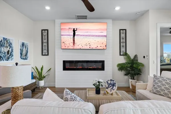 a kitchen with granite countertop lots of counter top space and wooden floor