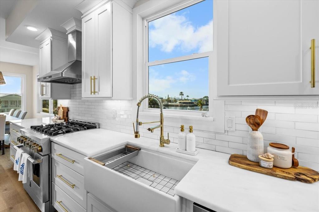 3344 Gulfview Drive Hernando Beach, FL 34607 - Photo 17 of 70 a kitchen with a stove and a sink