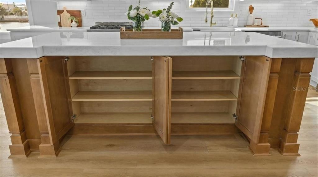 3344 Gulfview Drive Hernando Beach, FL 34607 - Photo 21 of 70 a view of storage and utility room with wooden floor