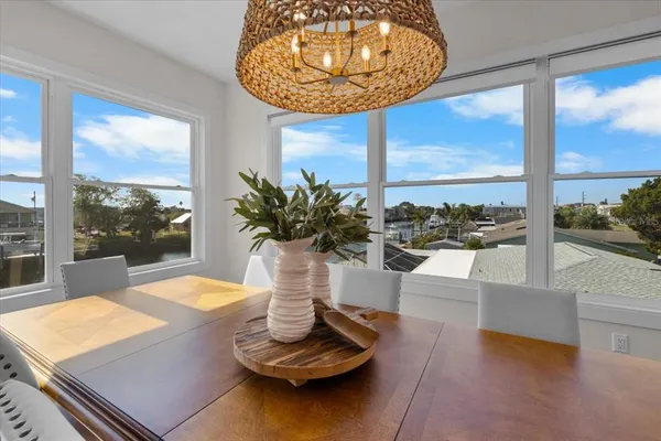 a bathroom with double vanity sinks a vanity and a mirror
