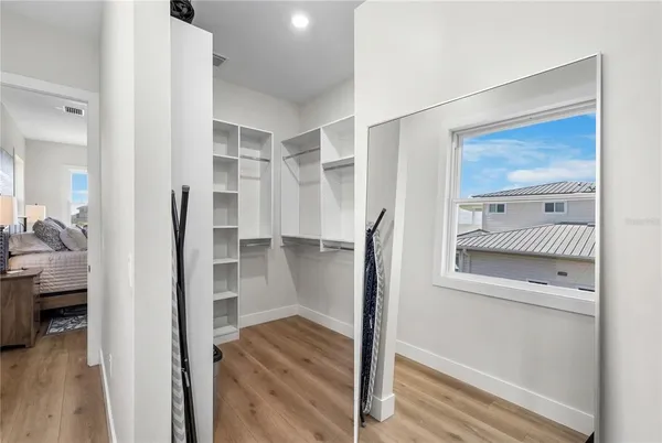 a utility room with sink dryer and washer