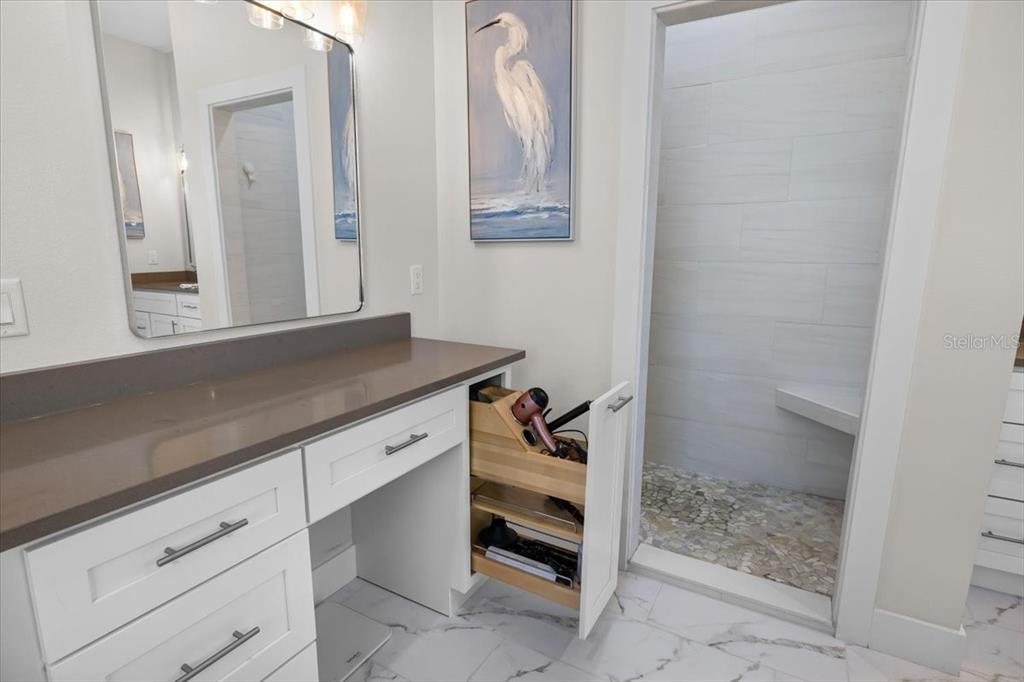 3344 Gulfview Drive Hernando Beach, FL 34607 - Photo 35 of 70 a bathroom with a sink and a mirror