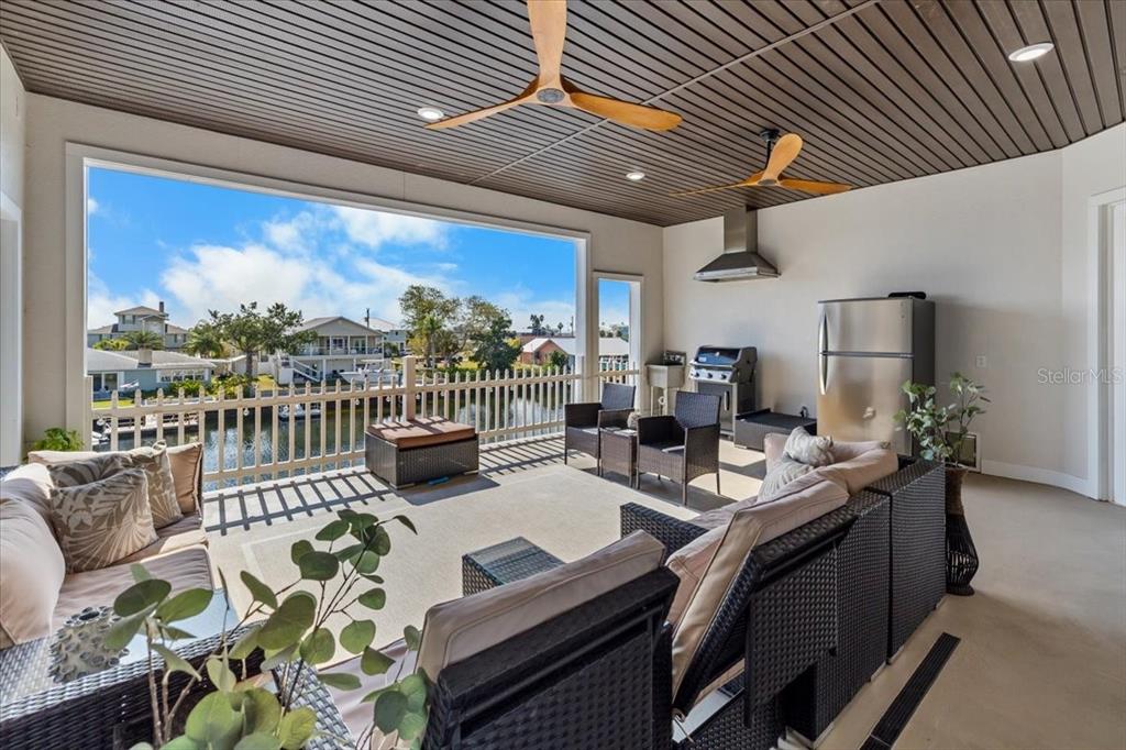 3344 Gulfview Drive Hernando Beach, FL 34607 - Photo 41 of 70 a living room with furniture and a large window