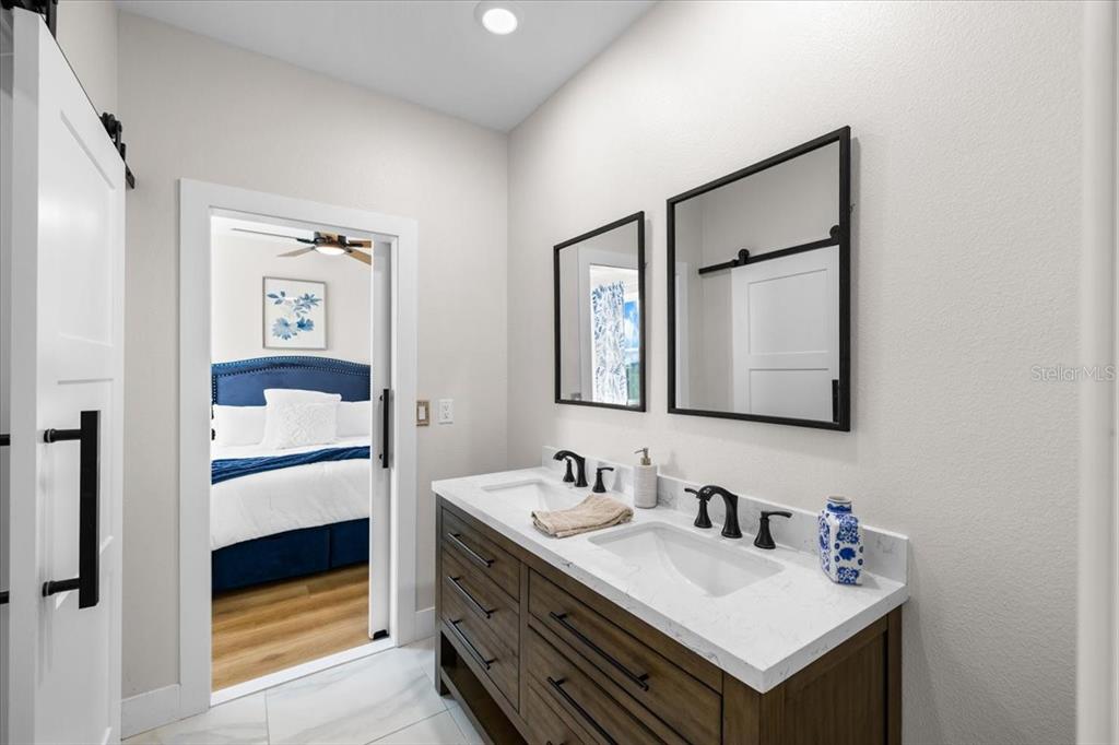 3344 Gulfview Drive Hernando Beach, FL 34607 - Photo 53 of 70 a bathroom with a sink and a mirror