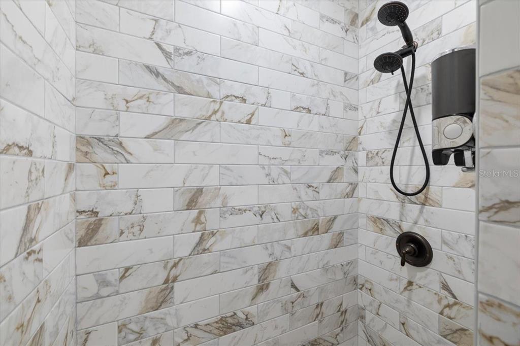 3344 Gulfview Drive Hernando Beach, FL 34607 - Photo 54 of 70 a bathroom with a shower