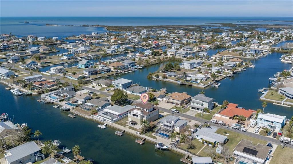 3344 Gulfview Drive Hernando Beach, FL 34607 - Photo 64 of 70 an aerial view of a city with ocean view