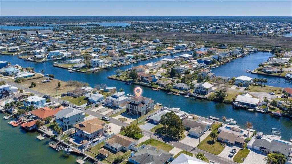 3344 Gulfview Drive Hernando Beach, FL 34607 - Photo 68 of 70 an aerial view of a house with a lake view