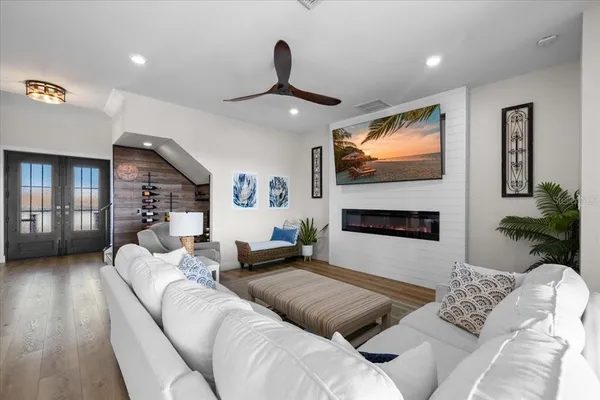 an aerial view of residential houses with outdoor space and street view