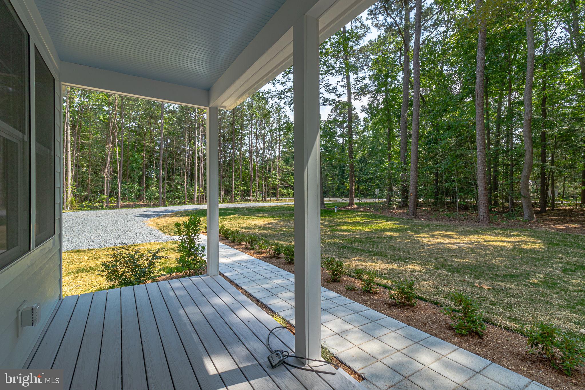 57 Waterman's Way Reedville, VA 22539 - Photo 37 of 43 Front porch, paver walkway