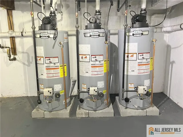 a view of living room with stainless steel appliances granite countertop lots of furniture