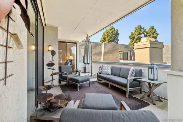 a bathroom with a granite countertop sink mirror and vanity