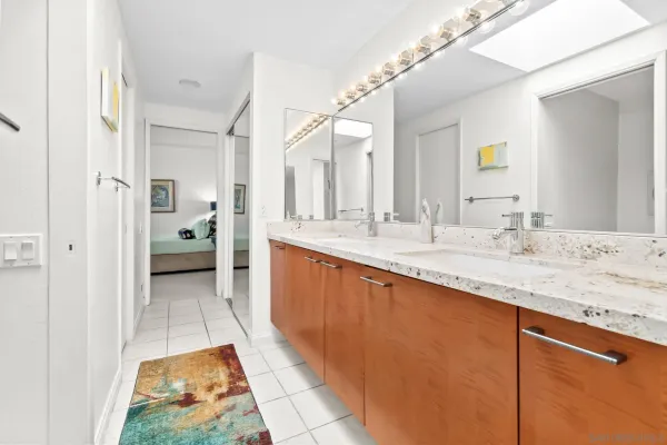 an aerial view of a house with a yard and garden