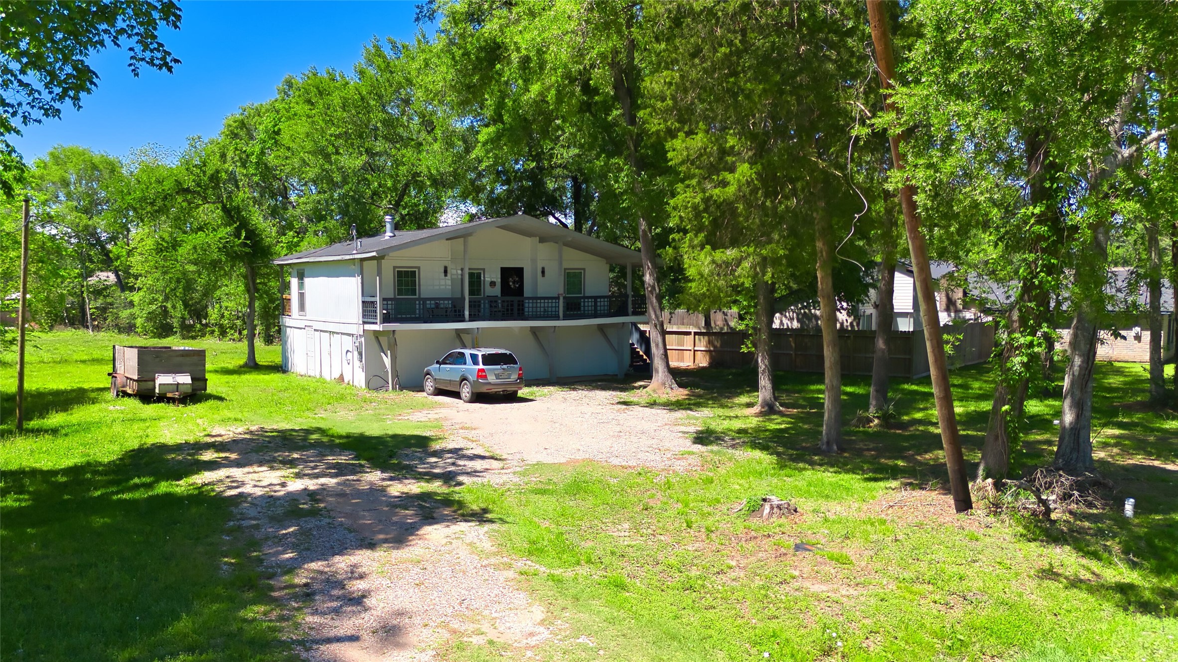 22418 East Shorewood Loop Houston, TX 77336 - Photo 15 of 20 a front view of a house with garden
